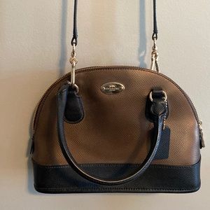 Coach black and rose gold cross body purse